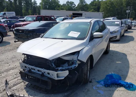 2018 Ford Focus Titanium z USA, uszkodzony, nr VIN 1FADP3J27JL294615